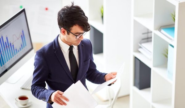 Business man checking documents